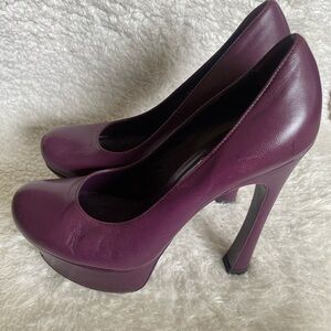 Gently worn platform purple pumps